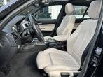 BMW 1 Serie 118i High Executive Schuifdak | Leder, 65 €/maand, Gebruikt, Met garantie (alle), Zwart