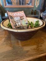 Oude aardewerk kom, begin 1900, Ophalen