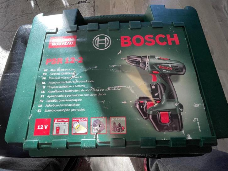 Bosch psr12-2 accuboormachine 2 accus en oplader in koffer, Doe-het-zelf en Verbouw, Gereedschap | Boormachines, Gebruikt, Boormachine