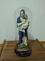 Maria en St. Jozefbeeld onder stolp, Ophalen