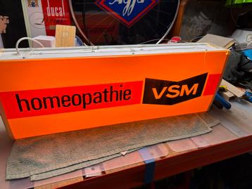 Saridon en vsm lichtreclame beschikbaar voor biedingen