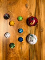 Bakugan, 2 grote + 7 kleine + magneerboard, Kinderen en Baby's, Speelgoed | Actiefiguren, Ophalen, Zo goed als nieuw