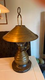 Koperen lamp, Ophalen