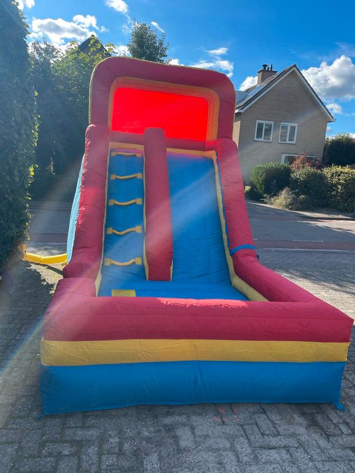 Luchtkussen met glijbaan - Feestplezier!, Kinderen en Baby's, Speelgoed | Buiten | Springkussens, Gebruikt, Ophalen of Verzenden