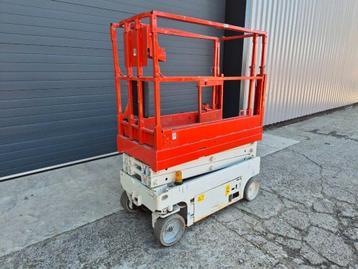 Genie GS1532 schaarlift elektrische hoogwerker (bj 2014) beschikbaar voor biedingen