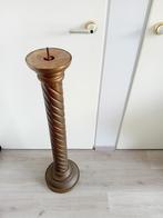 koper beslagen houten zuil, Ophalen