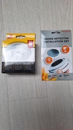 Nieuw! Rookmelder en een installatie set., Doe-het-zelf en Verbouw, Ophalen of Verzenden, Nieuw, Detector, Sensor of Melder, Rook