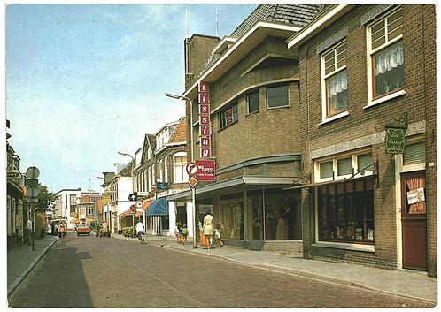 805524	Lisse	ZH 1974 gel in 81 Kanaalstraat	_Gelopen met moo, Verzamelen, Ansichtkaarten | Nederland, Zuid-Holland, 1960 tot 1980