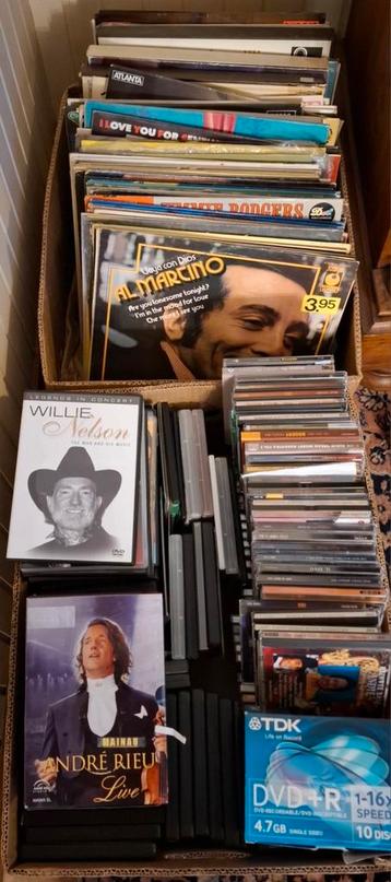 2 dozen LP's, cd's en muziek dvd's beschikbaar voor biedingen