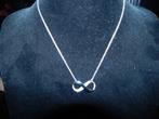 Swarovski ketting infinity teken met swarovski steentjes, Overige materialen, Verzenden, Zo goed als nieuw, Verstelbaar