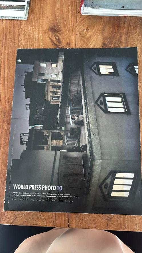 World Press Photo 2010, Boeken, Kunst en Cultuur | Fotografie en Design, Zo goed als nieuw, Fotografen, Ophalen of Verzenden