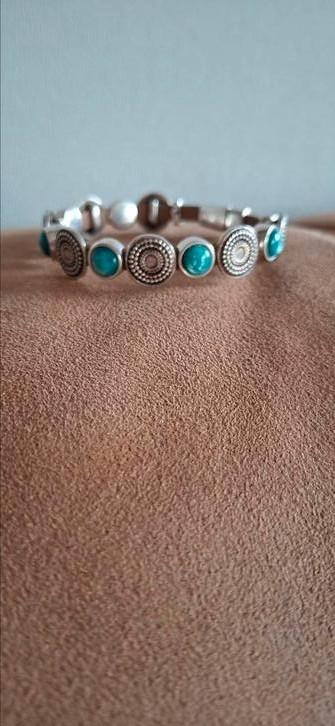 Qoss armband, Sieraden, Tassen en Uiterlijk, Armbanden, Zo goed als nieuw, Overige materialen, Blauw, Ophalen of Verzenden