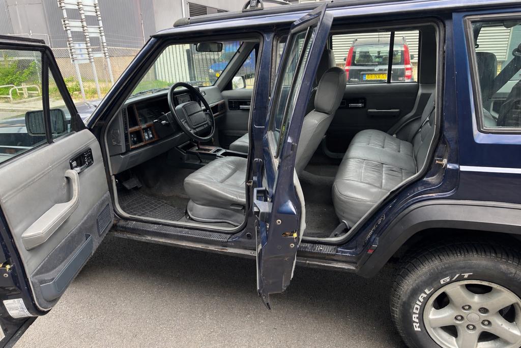 Jeep Cherokee 4.0 I SE AUT 4WD 1995 Blauw, Auto's, Blauw, Origineel Nederlands, 3960 cc, Vierwielaandrijving