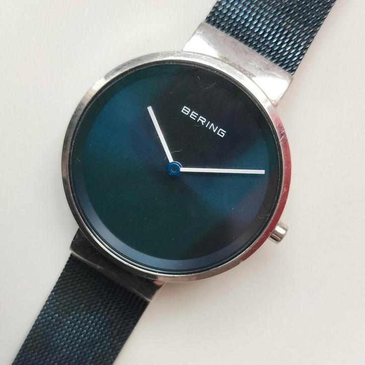 Te koopdonkerblauw BERING horloge., Sieraden, Tassen en Uiterlijk, Horloges | Dames, Overige merken, Staal, Ophalen of Verzenden