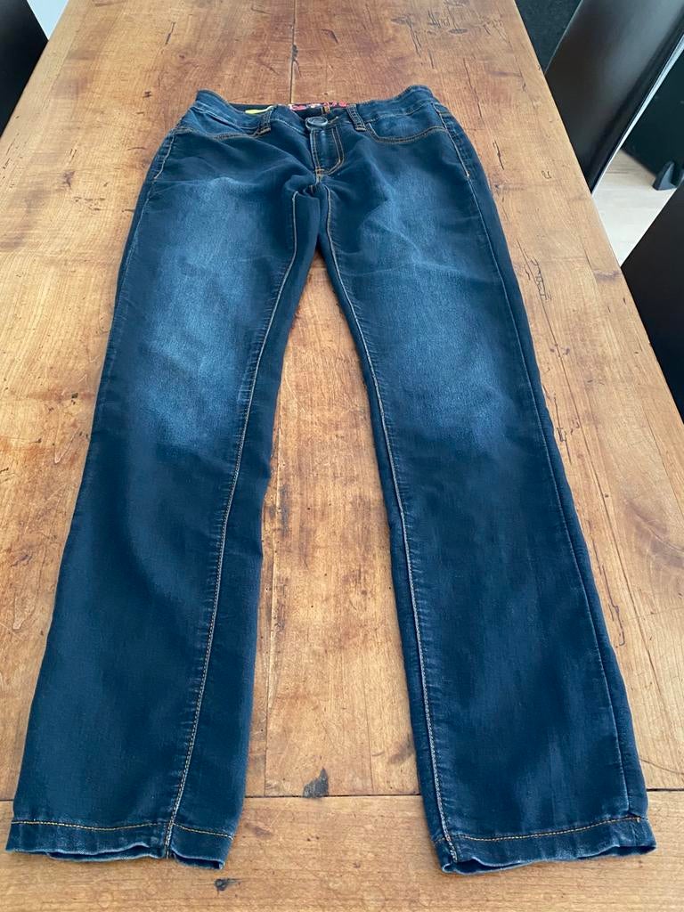 Desigual S spijkerbroek, Ophalen