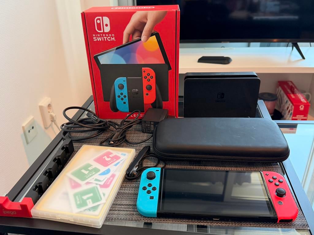 Nintendo Switch OLED — als nieuw + extra’s, Spelcomputers en Games, Spelcomputers | Nintendo Switch, Ophalen of Verzenden, Zo goed als nieuw