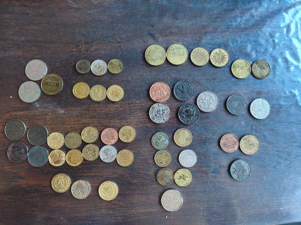 lot 48 munten capcom, nintendo, disney, marvel, Ophalen of Verzenden, Overige materialen