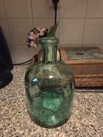 Groene glazen fles, Ophalen