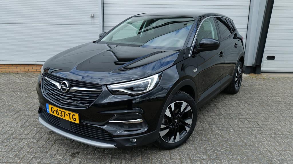 Opel Grandland X 1.2 Turbo Ultimate NL Auto NIEUWE Distribut, Auto's, Opel, Gebruikt, 1199 cc, Zwart, Bedrijf