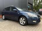 Kia Cee'd Sporty Wagon 1.4 CVVT Seven (12 mnd BOVAG-garantie, Stof, Gebruikt, Zwart, 4 cilinders