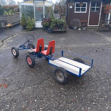 Skelter met duozit en aanhanger beschikbaar voor biedingen