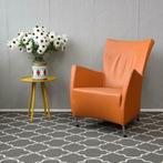 1x Montis Windy fauteuil + bijbehorende hocker - oranje, Huis en Inrichting, Fauteuils, Leer, Ophalen of Verzenden, Zo goed als nieuw
