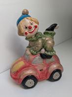 Spaarpot Volkswagen Kever met clowntje, Ophalen of Verzenden, Zo goed als nieuw, Steen, Aardewerk of Keramiek, Vervoermiddel