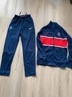 PSG trainingspak blauw/rood tenue van Nike maat 152, Jongen of Meisje, Gebruikt, Ophalen of Verzenden, Sport- of Zwemkleding