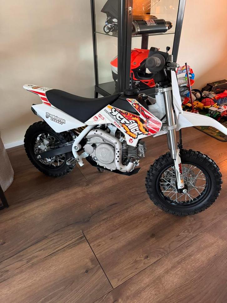 Kinder crossmotor, Fietsen en Brommers, Minibikes, Midibikes en Pitbikes, Zo goed als nieuw, Overige typen, Ophalen of Verzenden