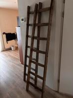 Oude houten ladder als decoratie, Ophalen