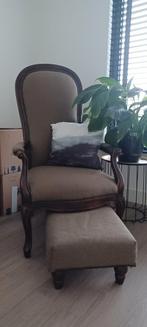 Stoel met voetbank, Ophalen