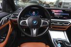 BMW i4 eDrive40 High Executive M Sport / Schuif-kanteldak /, Auto's, BMW, Achterwielaandrijving, Gebruikt, Met garantie (alle)