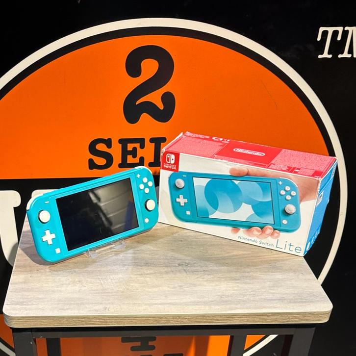 Nintendo Switch Lite - Turquoise - Garantie, Spelcomputers en Games, Spelcomputers | Nintendo Switch, Gebruikt