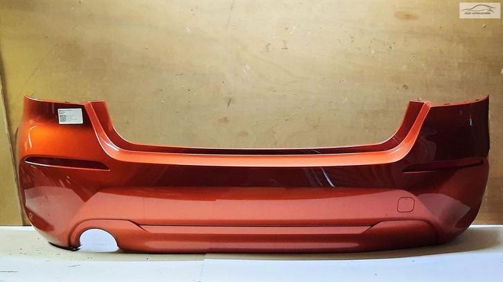 Achterbumper orgineel BMW 1-serie F40 v.a '19 Sunset Orange, Auto-onderdelen, Carrosserie en Plaatwerk, Bumper, BMW, Achter, Gebruikt