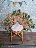 Rotan stoel met bloemmotief, Ophalen