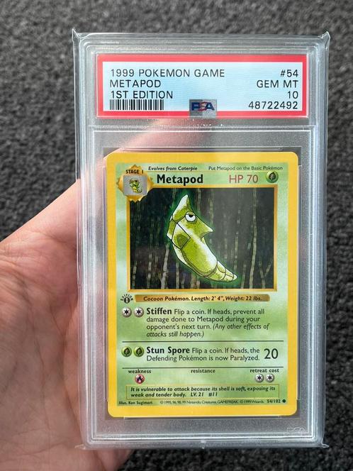 Pokémon PSA 10 1st edition Metapod #54 Base set, Hobby en Vrije tijd, Verzamelkaartspellen | Pokémon, Zo goed als nieuw, Losse kaart