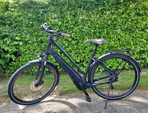 Elektrische fiets Specialized Como, Fietsen en Brommers, Elektrische fietsen, Zo goed als nieuw, Overige merken, 50 km per accu of meer