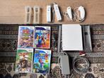 Complete Nintendo Wii met spellen en accessoires, Ophalen of Verzenden, Zo goed als nieuw, Met 2 controllers, Met games