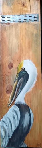 Pelikaan geschilderd op steigerhout, Ophalen