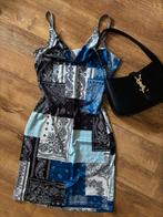 Korte jurk met design, Ophalen of Verzenden, Zo goed als nieuw, Boven de knie