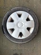 Winterbanden Suzuki Swift incl. velg en wieldop, Ophalen, Gebruikt, 15 inch, Banden en Velgen