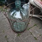 Vintage fles in ijzeren mand, Ophalen
