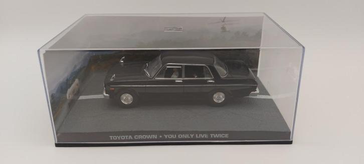 #56 Toyota Crown James bond auto met boekje, Hobby en Vrije tijd, Modelauto's | 1:43, Nieuw, Auto, Universal Hobbies, Verzenden