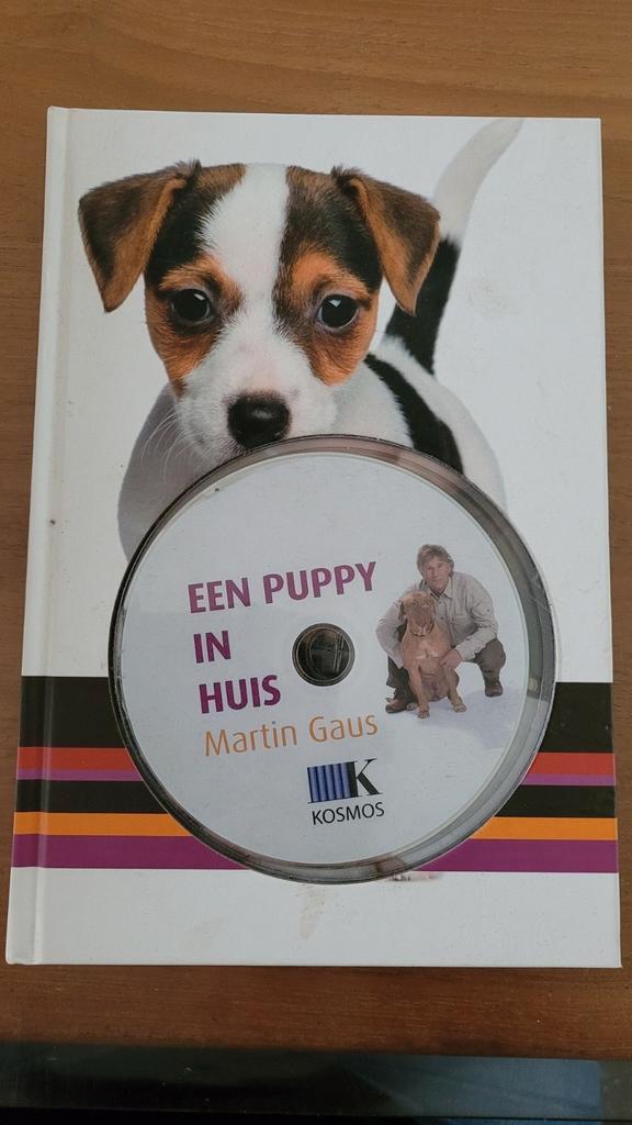 Martin Gaus - Een puppy in huis + DVD, Boeken, Dieren en Huisdieren, Zo goed als nieuw, Honden, Ophalen of Verzenden
