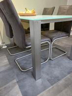Eettafel met glazen blad en vier stoelen 140 x 90, Huis en Inrichting, Tafels | Eettafels, Ophalen, Gebruikt, 100 tot 150 cm, 50 tot 100 cm