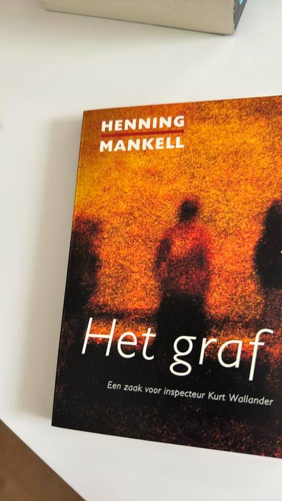 Henning Mankell - Het graf, Boeken, Thrillers, Zo goed als nieuw, Nederland, Ophalen of Verzenden