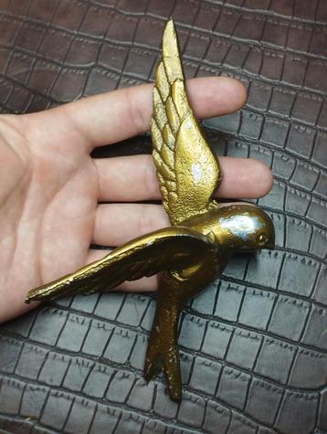 aan de muur bevestigd aluminium vogelbeeldje beschikbaar voor biedingen