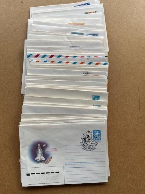 100 POSTWAARDESTUKKEN RUSLAND MET SPECIALE STEMPELS, Verzenden, Envelop