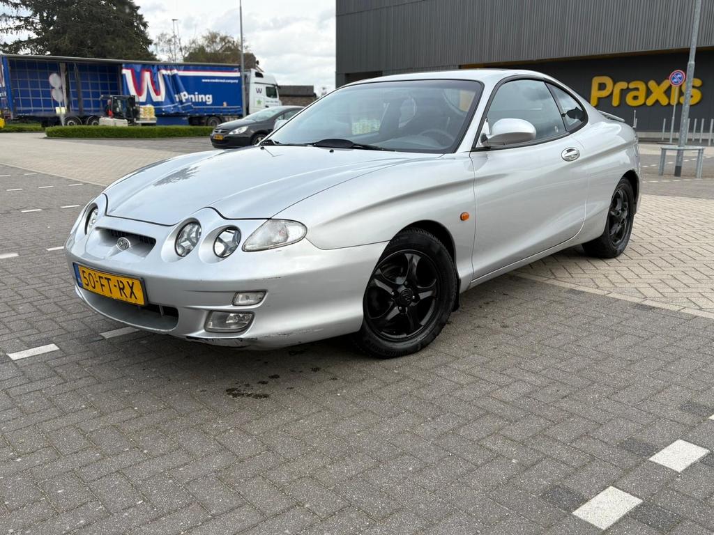 Hyundai Coupé 2.0 I F 2000 Grijs, Auto's, Hyundai, Bedrijf, Coupé, Benzine, Coupé, Handgeschakeld, Origineel Nederlands, Zilver of Grijs