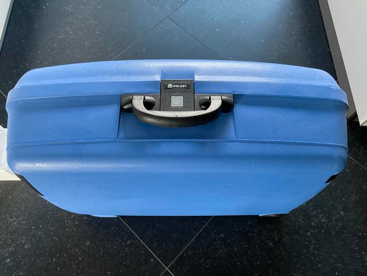 Blauwe Delsey koffer, Sieraden, Tassen en Uiterlijk, Koffers, Gebruikt, Hard kunststof, 60 tot 70 cm, 45 tot 55 cm, Wieltjes, Ophalen of Verzenden